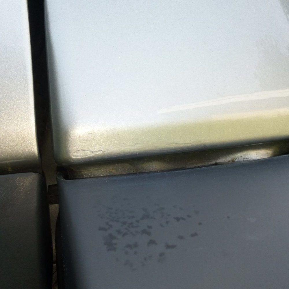 "After" pic of paint. Gerber charged 1.4 hrs but only did 30 min. (Tried to return car with no paint, 30 min later said paint is done.)