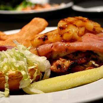 Coaches Bar & Grill - After eating this big bite of heaven, you won't know if your coming or going.  Aloha is a tender juicy chicken sammie with ham & pineapple. - Sports Bars Near Me - Bloomington, Indiana