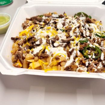 Medina's Tri Tip Company - Chilli tri tip fries, don't forget the avacado sauce! - Sandwiches Near Me - Lowell, Arkansas Medina's Tri Tip Company - Chilli tri tip fries, don't forget the avacado sauce! - Sandwiches Near Me - Lowell, Arkansas