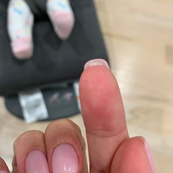 Chliney Nail and Spa - More product leftover inside my nail - Nail Salons Near Me - Hicksville, New York