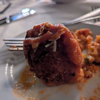 Mezzo Ristorante & Lounge - Partially eaten arancini. They're big! - Italian Near Me - Windsor, Ontario Mezzo Ristorante & Lounge - Partially eaten arancini. They're big! - Italian Near Me - Windsor, Ontario