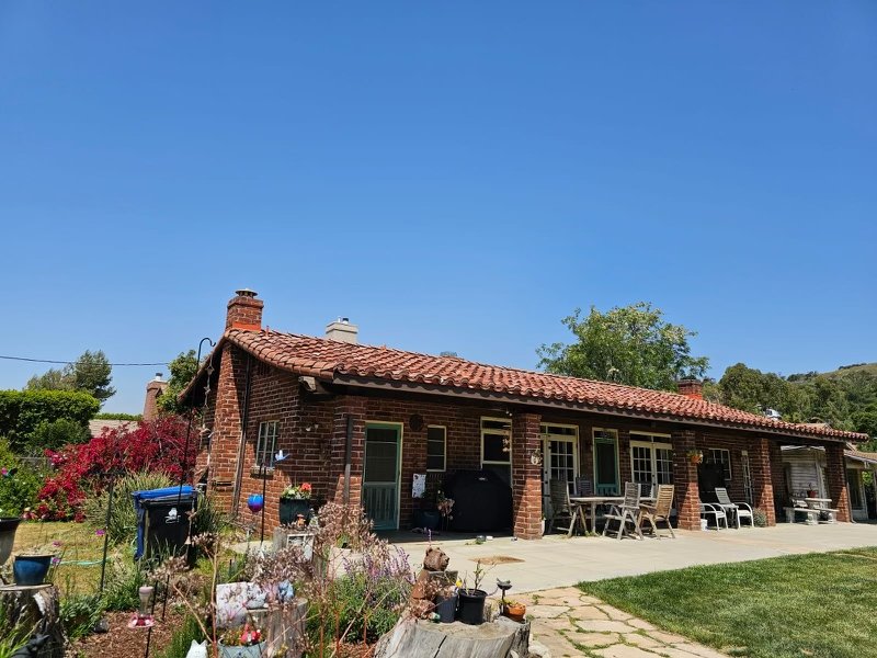 Slide of Optimal Roofing & Solar