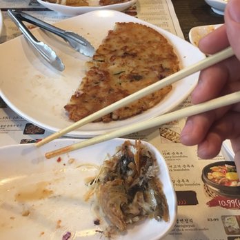 DuBu - Half of the seafood pancake and a completely dissected yellow croaker - Korean Near Me - Elkins Park, Pennsylvania