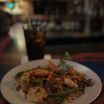 Ate Track - Queso Shrimp & Lobster - roasted shrimp, lobster. peppers, onions, mushrooms, and jalapeños over spicy queso rice - New American Near Me - Cartersville, Georgia