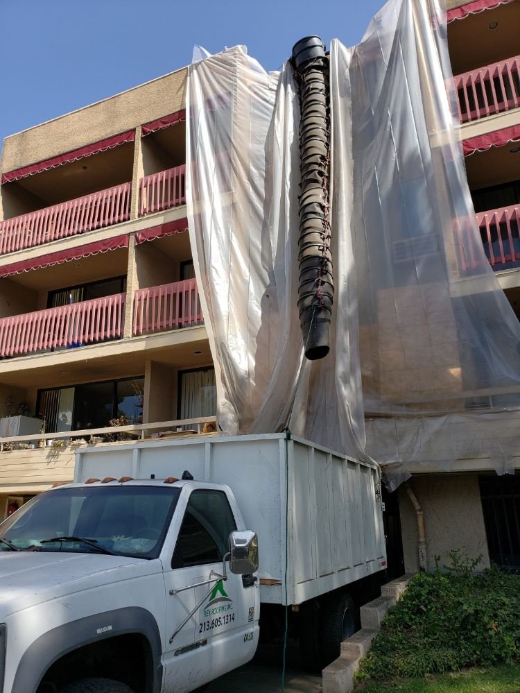 Slide of Rex Roofing