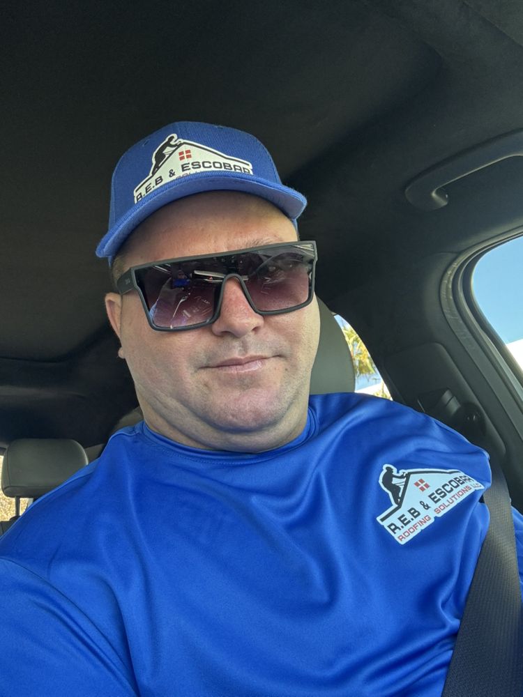 Slide of R E B & Escobar Roofing Solution