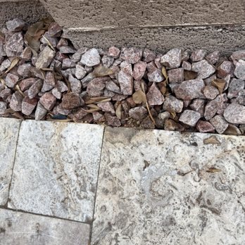 Benchmark Landscape & Design - Huge chip defect on a piece of travertine that should never have been used. - Landscaping Near Me