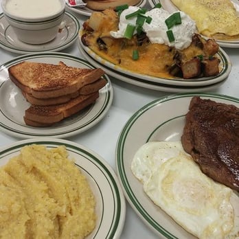 Louie's Cafe - Steak & Eggs. Grits. Super Cajun hash browns, Mitchell omelette - Breakfast & Brunch Near Me - Baton Rouge, Louisiana Louie's Cafe - Steak & Eggs. Grits. Super Cajun hash browns, Mitchell omelette - Breakfast & Brunch Near Me - Baton Rouge, Louisiana
