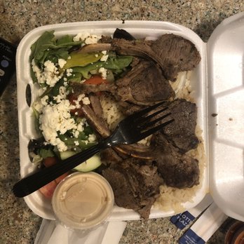 Greek On The Street - a meal in a styrofoam container - Food Trucks Near Me Greek On The Street - a meal in a styrofoam container - Food Trucks Near Me
