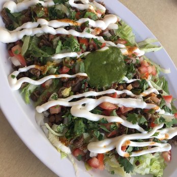 Baby's Tacos - Asada nachos but substitute the chips for lettuce - Tacos Near Me - Pomona, California