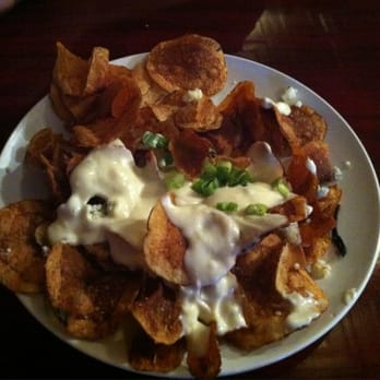 Recess Southern Gastro-pub - Chips with blue cheese crumbles....is actually chips with blue cheese dressing. - New American Near Me - Gainesville, Georgia