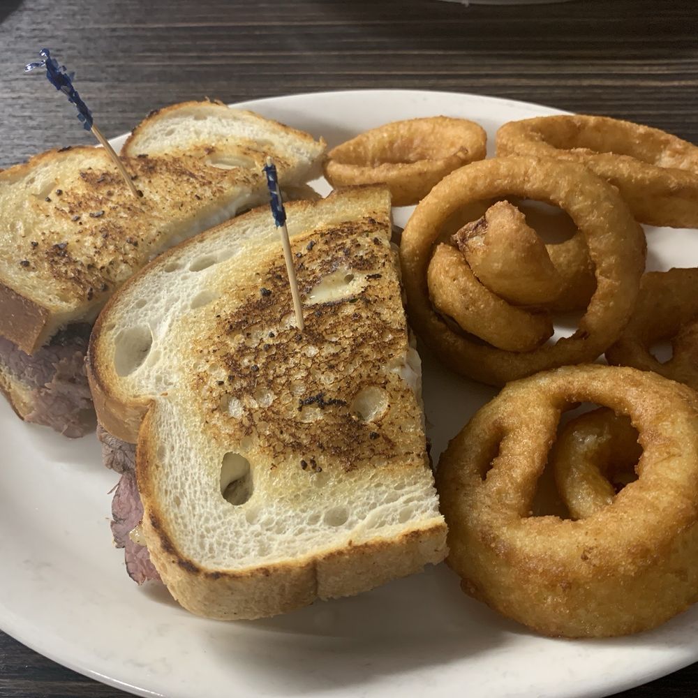 Osorio Brother's - Roast Beef Melt with Onion Rings - Pizza Near Me - Rimforest, California Osorio Brother's - Roast Beef Melt with Onion Rings - Pizza Near Me - Rimforest, California