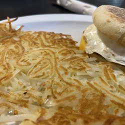 Mom's Restaurant & Pub - Tons of crispy hashbrowns! This is one of the Senior Specials: Egg, Sausage & Cheese Muffin ($5.99)