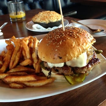 Engine Room - Smoked Pork Burger with the baked Mac 'N Cheese in the background. - Southern Near Me - Mystic, Connecticut Engine Room - Smoked Pork Burger with the baked Mac 'N Cheese in the background. - Southern Near Me - Mystic, Connecticut