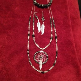 From Alfonda's Arts & Crafts of Navajoland. She initially didn't have any matching earrings, so she made them while I waited! From Alfonda's Arts & Crafts of Navajoland. She initially didn't have any matching earrings, so she made them while I waited!