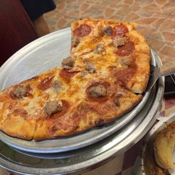 Manny's Pizza House VI - Thin crust sausage and pepperoni - Pizza Near Me - Port Orange, Florida