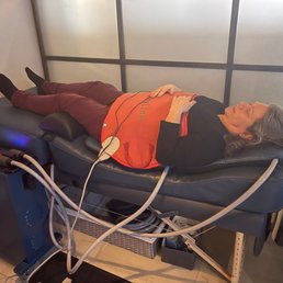 Getting a heated red LED light on my stomach and electrical pads underneath my body.