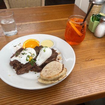 Shorehouse Kitchen - Short rib hash brown eggs With side of hollandaise sauce - Breakfast & Brunch Near Me - Carlsbad, California Shorehouse Kitchen - Short rib hash brown eggs With side of hollandaise sauce - Breakfast & Brunch Near Me - Carlsbad, California