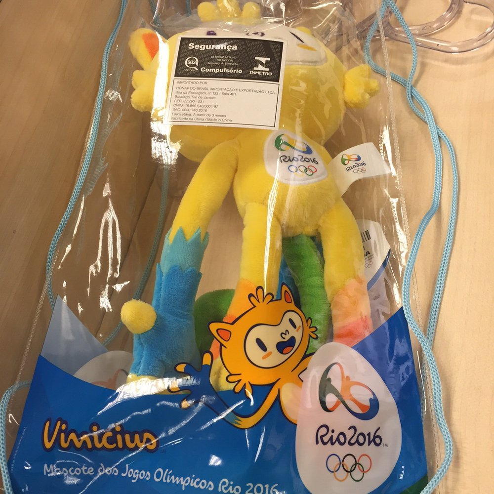 Loja Rio 2016 Official Store - Vinicius, the official mascot of the Rio Olympics runs a steep price tag of R$100 but comes in his own backpack bag with his name. - Sporting Goods Near Me - Rio de Janeiro, RJ