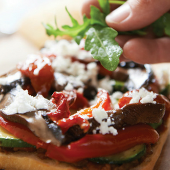 Williams Fresh Cafe - a hand sprinkling a piece of fresh basil over a sandwich - Cafes Near Me - Niagara Falls, Ontario Williams Fresh Cafe - a hand sprinkling a piece of fresh basil over a sandwich - Cafes Near Me - Niagara Falls, Ontario