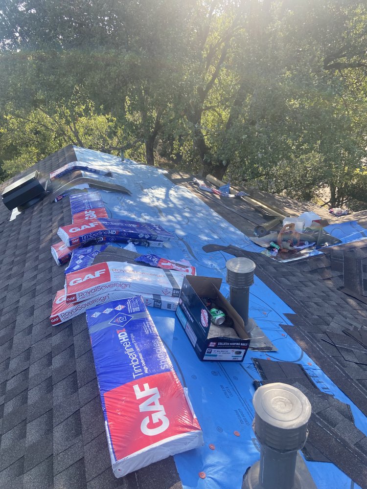 Slide of Arbiter Roofing