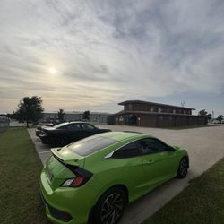 Delta Autos - Rental line in front of office.