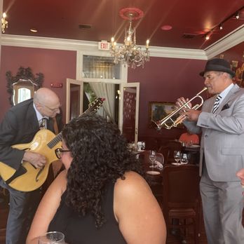 Muriel's Jackson Square - jazz performers going table to table - Cajun/Creole Near Me - New Orleans, Louisiana Muriel's Jackson Square - jazz performers going table to table - Cajun/Creole Near Me - New Orleans, Louisiana
