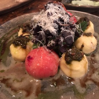 Esther's Kitchen - Ricotta Gnudi (the pink things are beets, and there are greens in the middle) - Italian Near Me - Las Vegas, Nevada