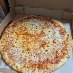 Gino's Pizza & Spaghetti House - Extra cheese!
