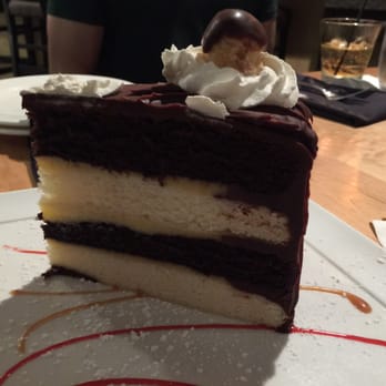 BB's - Chocolate Boston Cream Cake? The cake itself was light and fluffy. The icing on the top and sides was super rich and decadent. - New American Near Me - Jacksonville, Florida BB's - Chocolate Boston Cream Cake? The cake itself was light and fluffy. The icing on the top and sides was super rich and decadent. - New American Near Me - Jacksonville, Florida