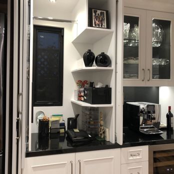Paradigm Design Solutions - a kitchen with white cabinets and black countertops - General Contractors Near Me - Los Angeles, California Paradigm Design Solutions - a kitchen with white cabinets and black countertops - General Contractors Near Me - Los Angeles, California