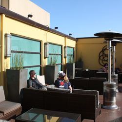 Outdoor speakers installed in a hotel bar patio