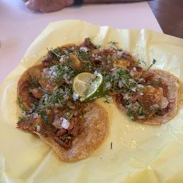 Al pastor tacos (plate comes with 5 tacos for $11) Al pastor tacos (plate comes with 5 tacos for $11)