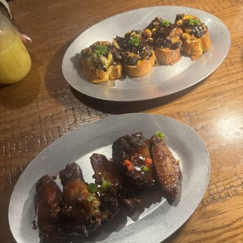 Dunns River Lounge - Wings and oxtail toast - Lounges Near Me - Rockville Centre, New York