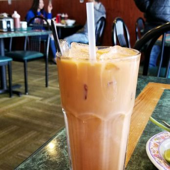 Pho Duy - a glass of iced coffee on a table - Vietnamese Near Me - Aurora, Colorado