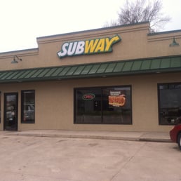 the entrance to a subway restaurant the entrance to a subway restaurant