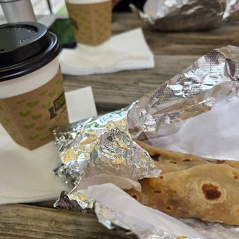 Vaquero Taquero - Chorizo and egg on flour, with a small latte coffee - Tacos Near Me - Austin, Texas Vaquero Taquero - Chorizo and egg on flour, with a small latte coffee - Tacos Near Me - Austin, Texas