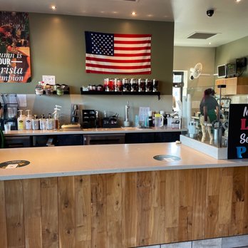 Starbucks - a coffee shop counter with american flag on the wall - Coffee & Tea Near Me - Prescott, Arizona Starbucks - a coffee shop counter with american flag on the wall - Coffee & Tea Near Me - Prescott, Arizona