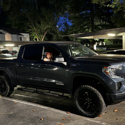 A & R Tires & Wheels - Truck lifted and tires with level kit.