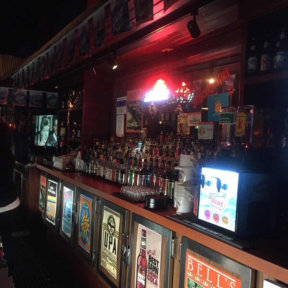 a man sitting at a bar a man sitting at a bar