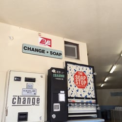 Launderland - Broken TV, Out of Order change machine, and Change Machine that cheats you... Along w/ the soap stop vending center.