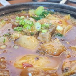 It is slightly spicy with tendon - numbing but tolerable
