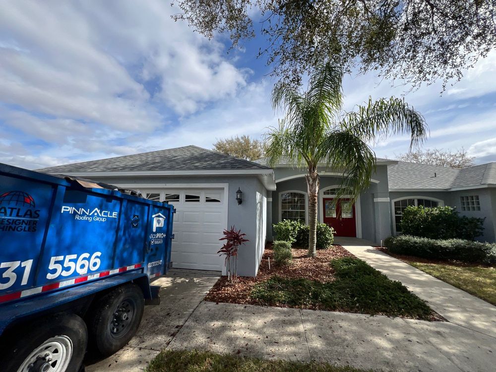 Slide of Pinnacle Roofing Group