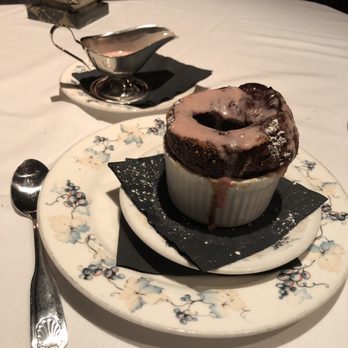 The Cellar Restaurant - Dark chocolate soufflé and raspberry sauce - French Near Me - Fullerton, California The Cellar Restaurant - Dark chocolate soufflé and raspberry sauce - French Near Me - Fullerton, California