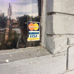 Do not be fooled by this sign. They only take cash. Luckily... they have an ATM! ($3 fee, of course).