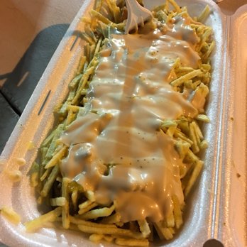Asados El Paisa - Corn with chicharron, cheese and potato sticks. $8.50 and really good. Topped with pink sauce. - Food Trucks Near Me - Miami, Florida