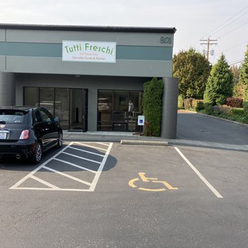 Tutti Freschi - two cars parked in a parking lot - Bakeries Near Me - Bellingham, Washington Tutti Freschi - two cars parked in a parking lot - Bakeries Near Me - Bellingham, Washington
