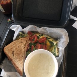 Goddess omelet cheese grits and wheat toast