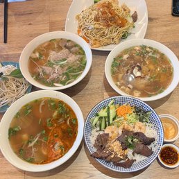 a variety of dishes of food a variety of dishes of food