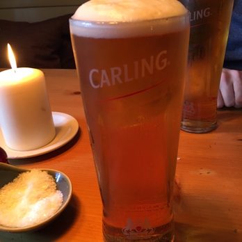 Masons Arms - Carling beers in branded glasses - Pubs Near Me - Cirencester, GLS